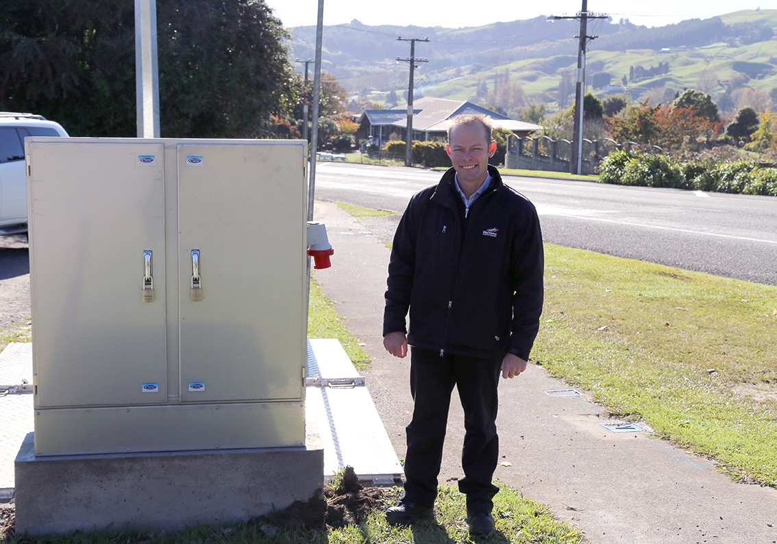 Asset Group Manager Kobus du Toit at the new control and power cabinet at the Awakino Road pump station.